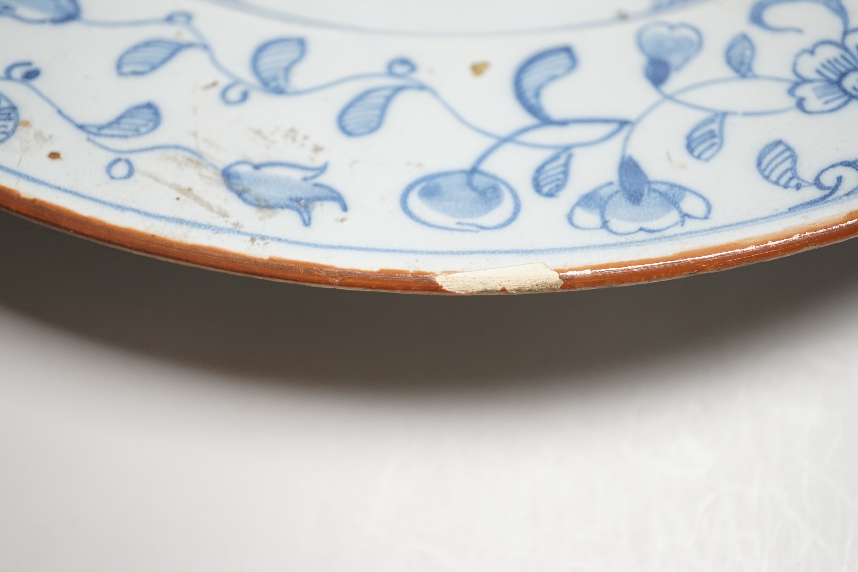 An 18th century Delft chinoiserie charger, 36cm diameter
